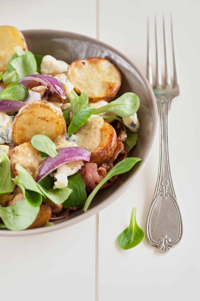 Warm potato salad with blue cheese
