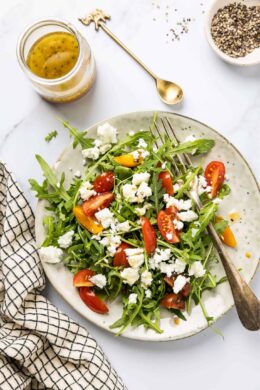 Arugula salad with feta and tomatoes