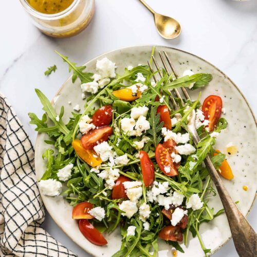 Arugula salad with feta and tomatoes