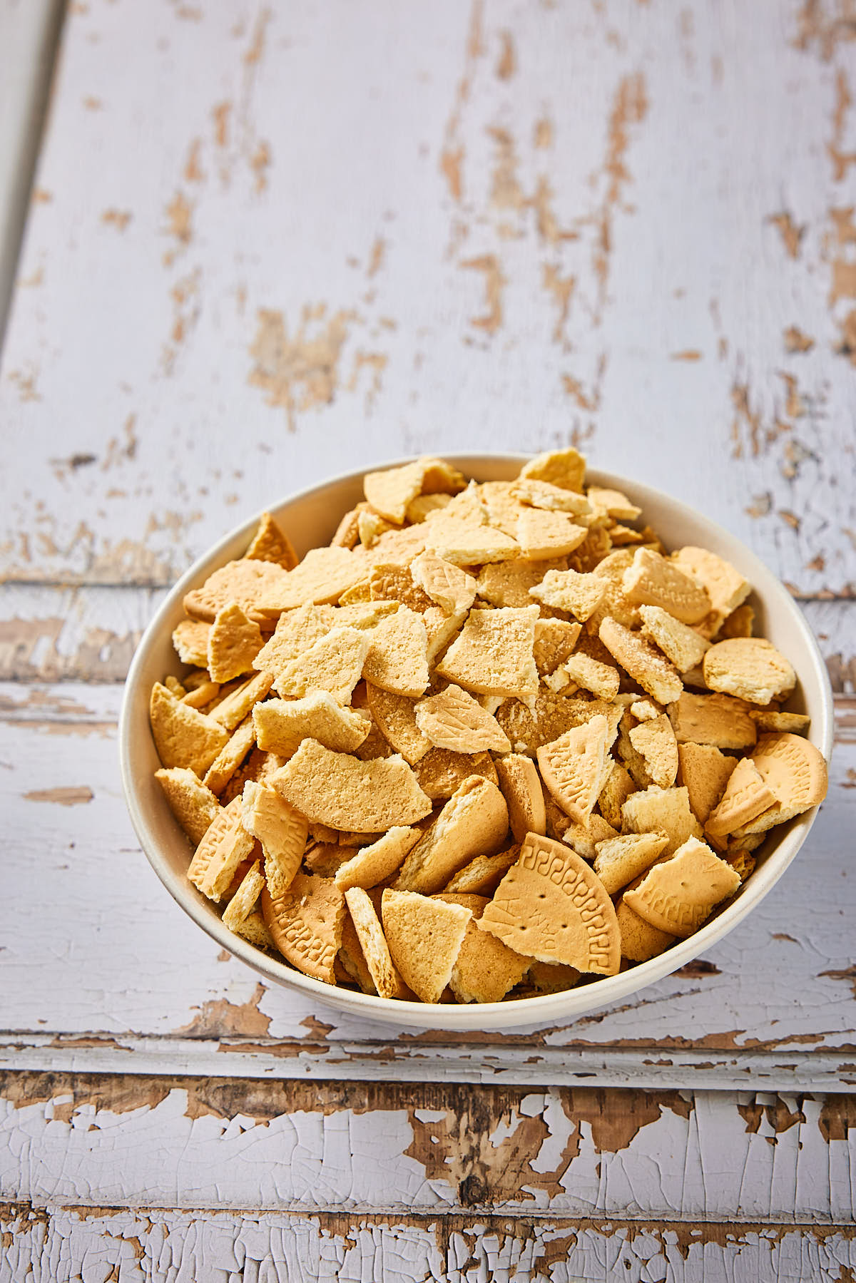 Break the biscuits into smaller pieces