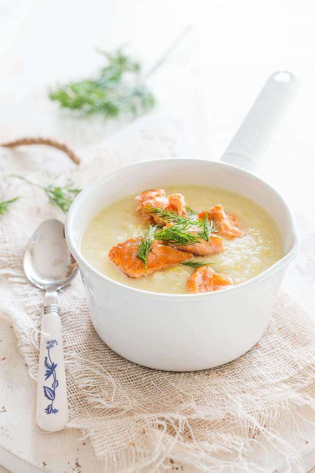Cauliflower celeriac soup with salmon fillet