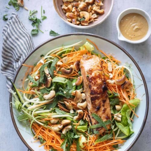 Asian salad with salmon and cashew dressing
