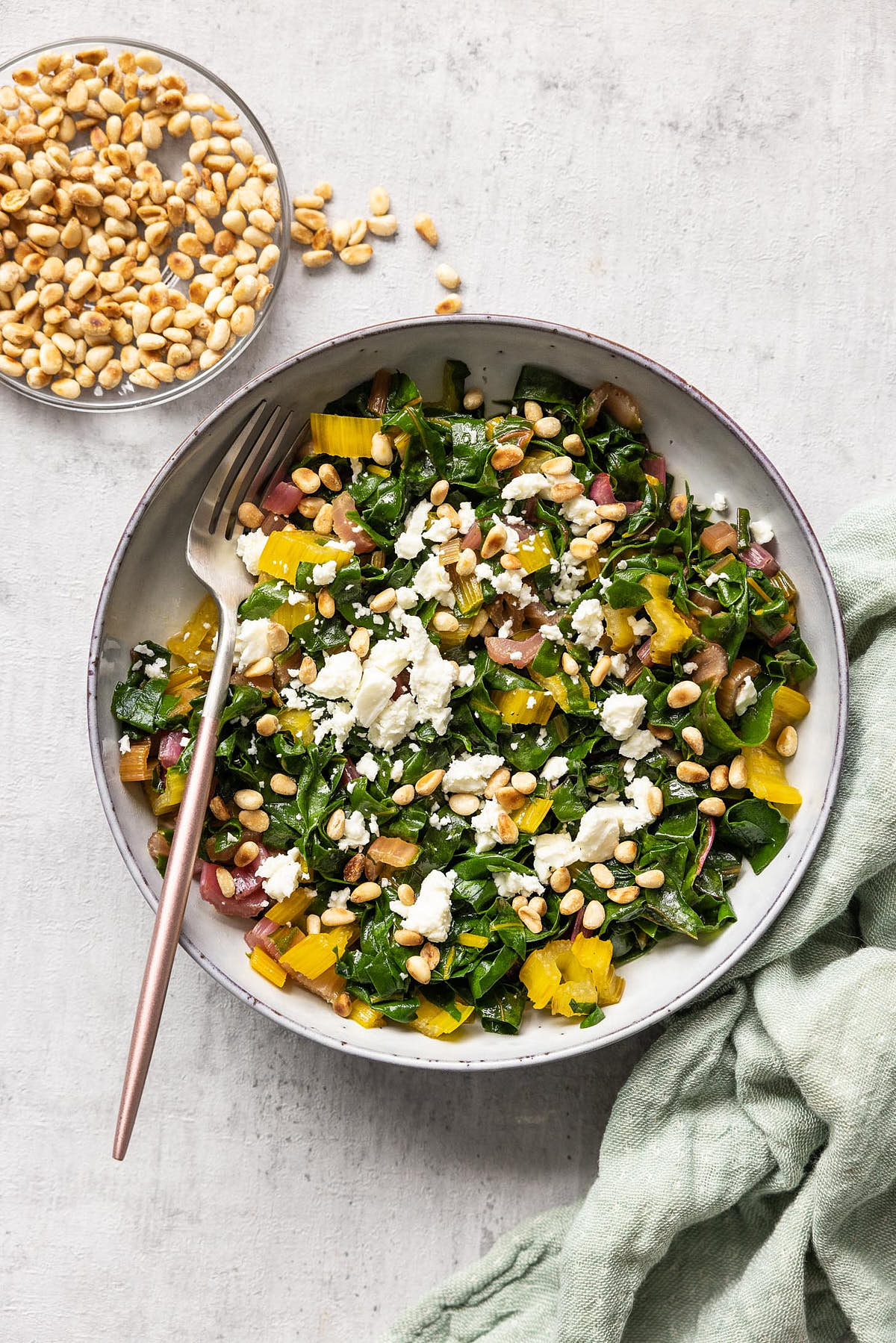 Swiss chard with feta and pine nuts