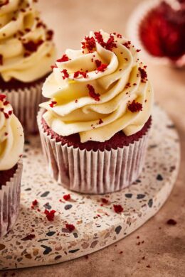 red velvet cupcakes with white chocolate buttercream frosting