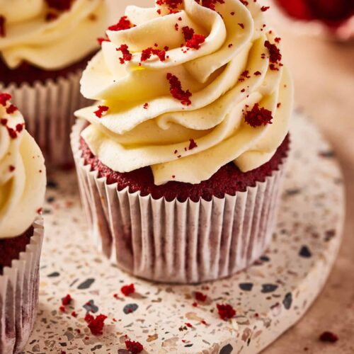 red velvet cupcakes with white chocolate buttercream frosting