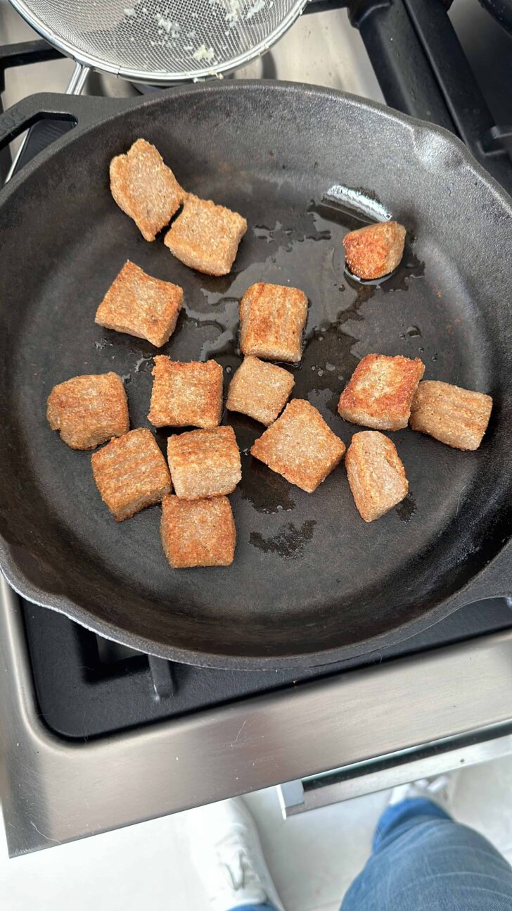 Baking the cauliflower gnocchi in the pan