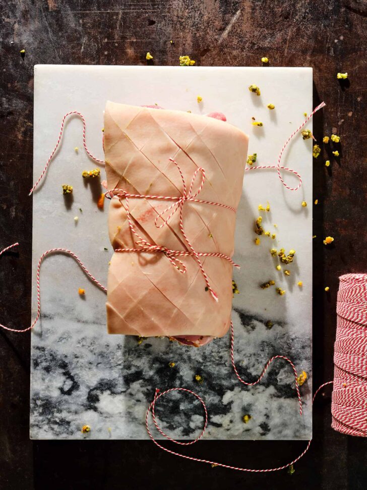 Rolling the porchetta